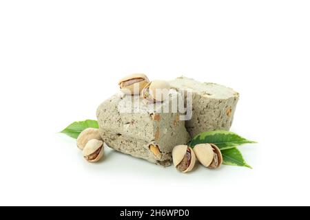 Halva con noci isolate su sfondo bianco Foto Stock