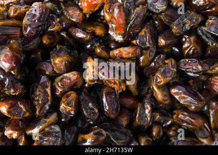 Frutta secca di data nella scatola , datate sfondo Foto Stock