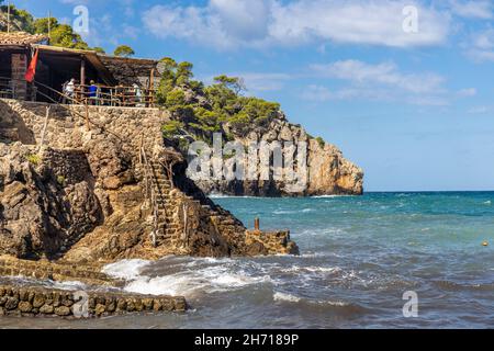 Cala Deià, baia e spiaggia vicino al villaggio Deià, Maiorca, Isole Baleari, Spagna Foto Stock