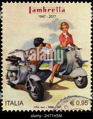 Poster vintage dello scooter Lambretta su francobollo italiano Foto Stock