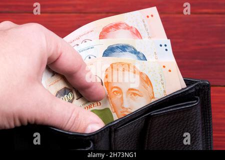 Singapore Money - dollaro nel portafoglio nero Foto Stock