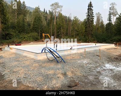 Edificio sostenibile dal punto di vista ambientale in costruzione in BC Canada Foto Stock