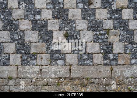 Alta texture di dettaglio / sfondo di un vecchio muro di pietra Foto Stock