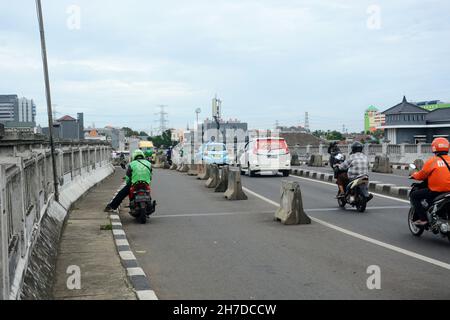 Condizioni e situazioni su strada a Giacarta Foto Stock