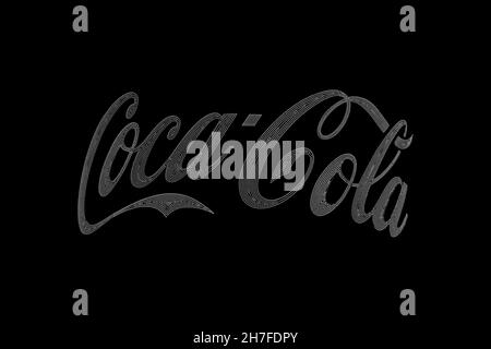 Almaty, Kazakhstan - 20 novembre 2021: Il logo Coca-Cola si illumina di bianco con i LED al buio. Pubblicità notturna Foto Stock