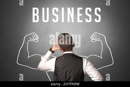 Vista posteriore di un uomo d'affari, potente concetto di business Foto Stock