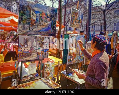 Artisti al lavoro in Place du Tertre a Montmartre, Parigi, Francia. Foto Stock