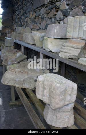 Reliquie di pietra a Glenluce 12 ° secolo Cistercense Abbazia rovina, Dumfries & Galloway, Scozia Foto Stock