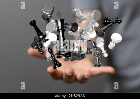 Rendering in 3D di pezzi di scacchi ologramma sulla mano di un uomo - tattiche di business e strategie di concetto Foto Stock