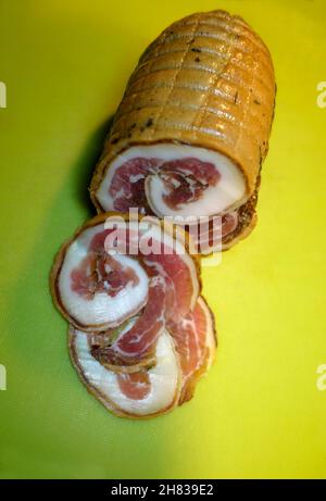 Arrotolata di pancetta Foto Stock