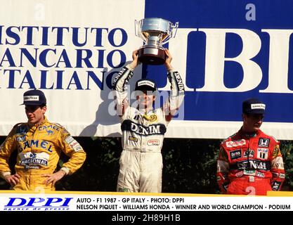 AUTO - F1 1987 - GP ITALIA - MONZA - FOTO: DPPI NELSON PIQUET - WILLIAMS HONDA - PODIO - AMBIENTE - RITRATTO AYRTON SENNA / LOTUS HONDA TURBO - NIGEL MANSELL / WILLIAMS HONDA - FOTO: DPPI/DPPI/LIVEMEDIA Foto Stock