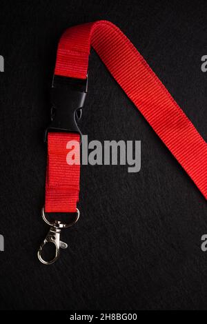 montaggio con moschettone su sfondo nero Foto Stock