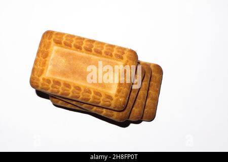 Colazione al mattino. Biscotto su sfondo bianco. Foto Stock