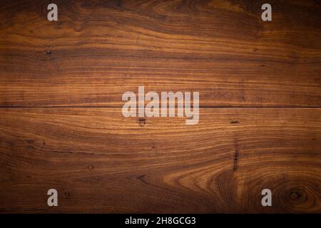 Teak legno asse sfondo desktop. Tessitura di legno di teak. Foto Stock