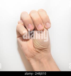 Lettera U in linguaggio dei segni americano (ASL) per sordi, mano maschile Foto Stock