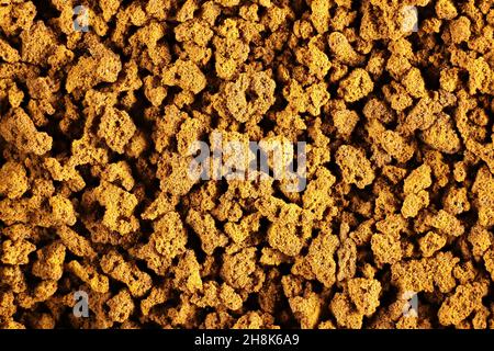 Fondo macro di granuli di caffè istantaneo Foto Stock