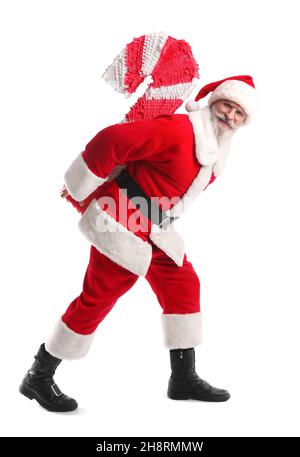 Babbo Natale con pinata di canna di caramella isolata su bianco Foto Stock