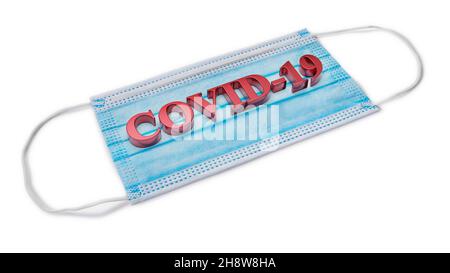 Texte sur COVID 19 on face mask. Concetto di coronavirus. rendering 3d Foto Stock