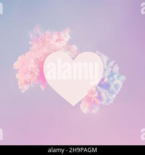Sfondo creativo astratto a forma di cuore al neon con spazio per la copia. Forma a cuore bianco vuoto in nuvole di vernice bianca in luce neon rosa. Composizione creativa al neon minimal per il design di San Valentino Foto Stock