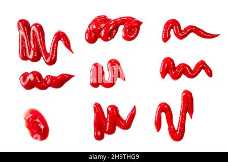 Ketchup spruzza isolato su sfondo bianco. Foto Stock