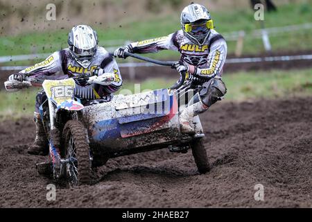 Tyninghame, Lothian orientale., Regno Unito. 12th Dic 2021. Ecosse XC - Round 1 Winter Series in pista vicino a Tyninghame, East Lothian. Concorrenti in classi da 65cc a Quad e sidecar. Un sacco di azione nel fango. ( Credit: Rob Grey/Alamy Live News Foto Stock