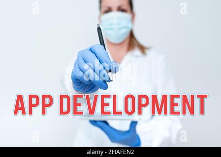 Didascalia di testo che presenta lo sviluppo dell'app. Panoramica aziendale servizi di sviluppo per esperienze mobili e web straordinarie che dimostrano la techologia medica Foto Stock
