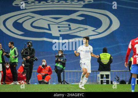 Marco Asensio del Real Madrid festeggia un gol durante la partita di calcio la Liga tra Real Madrid e Atletico de Madrid il 12 dicembre 2021 allo stadio Santiago Bernabeu di Madrid, Spagna - Foto: IRH/DPPI/LiveMedia Foto Stock