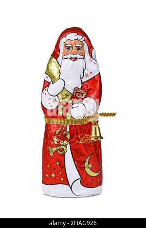 Dossenheim, Germania - Dicembre 2021: Cchocolate Santa Clause di Swiss Chocolatier Lindt su sfondo bianco Foto Stock