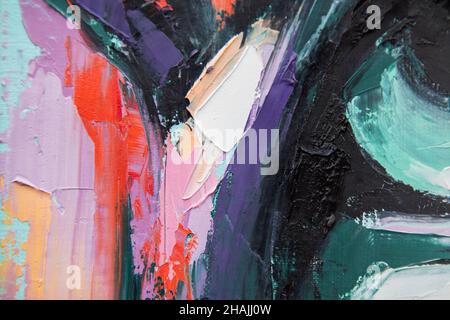 Primo piano concettuale astratto di un dipinto ad olio e coltello a palette su tela. Pittura ad olio in tonalità multicolore. L'immagine è dipinta in olio. Foto Stock