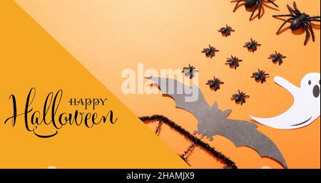 Immagine composita digitale di testo happy halloween su decorazioni animali spoky Foto Stock