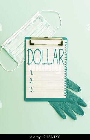 Cartello con scritto Dollar. Business concetto un pezzo di carta denaro vale un dollaro Federal Reserve nota scrittura importante Medical Notes laboratorio Foto Stock