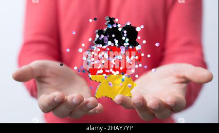 3D carta tedesca resa hovering sulla mano di una persona Foto Stock