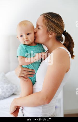 Mamma solo mantiene questi baci venire Foto Stock