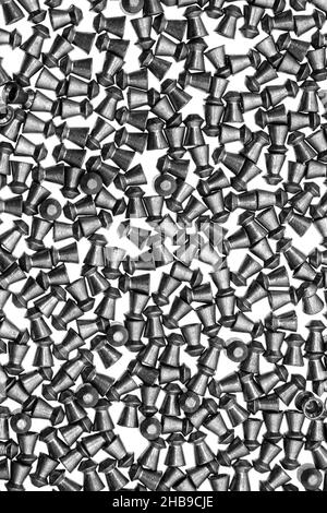 Munizioni per armi pneumatiche. Proiettili di piombo per pistola ad aria o fucile ad aria. Sfondo da brocche di piombo. Foto Stock