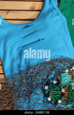 Mermaid Fashion con Gioielli e rete da pesca Foto Stock