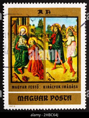 UNGHERIA - CIRCA 1973: Un francobollo stampato in Ungheria mostra l'Adorazione dei Re, dipinto da ungherese Anonymous Early Master, dal cristiano Mu Foto Stock