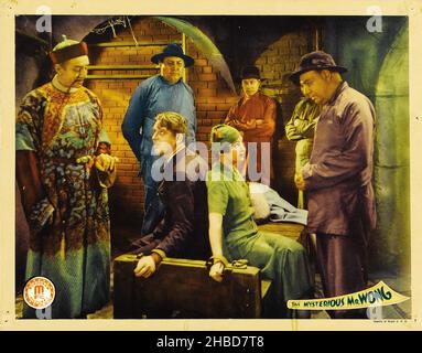 WALLACE FORD e ARLINE GIUDICE nel MISTERIOSO MR. WONG (1934), diretto da WILLIAM NIGH. Credito: IMMAGINI / Album DEI MONOGRAMMI Foto Stock