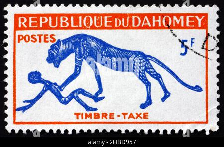 DAHOMEY - CIRCA 1963: Un francobollo stampato in Dahomey mostra Panther and Man, circa 1963 Foto Stock