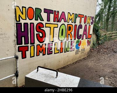 Storia sul muro nel Canal Grande Union Northampton Northamptonshire Regno Unito Foto Stock