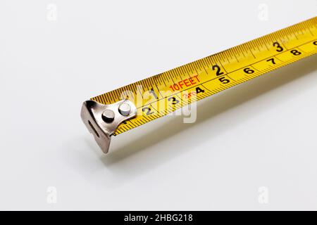nastro di misurazione che può essere arrotolato e utilizzato da artigiani Foto Stock
