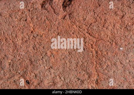 Un dettaglio macro della texture di un antico pezzo di ceramica Foto Stock