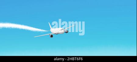 L'aereo passeggeri vola nel cielo blu lasciando un sentiero fumoso bianco Foto Stock