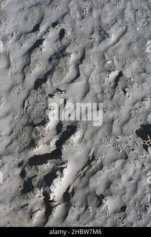 Luce e ombra in sabbia fine Foto Stock