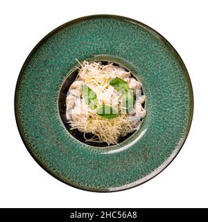 Fetuchini al sugo di panna con pollo e funghi Foto Stock