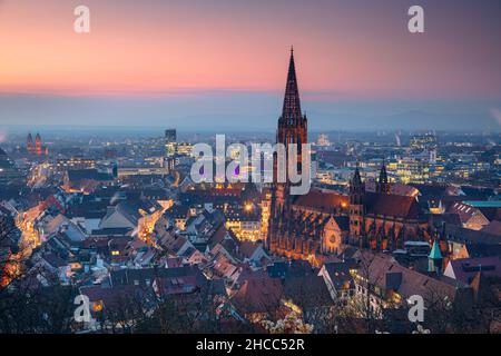 Freiburg im Breisgau, Germany. Aerial cityscape image of Freiburg im Breisgau, Germany with the Freiburg Minster at autumn sunset. Foto Stock