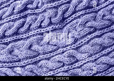 Tessuto lavorato a maglia molto peri colorato. Knitwear fatto a mano. Sfondo con texture. Colore dell'anno 2022 Foto Stock