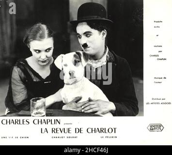 Ancora da vita di Un cane che recita Charlie Chaplin, Edna Purviance e scraps del cane - 1918 Foto Stock