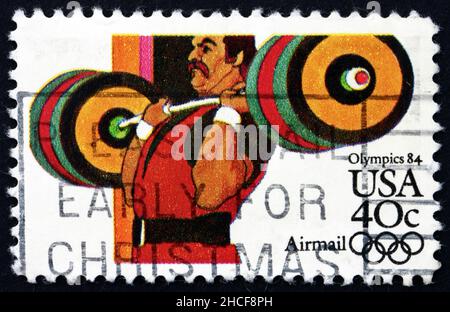 STATI UNITI D'AMERICA - CIRCA 1983: Un francobollo stampato negli Stati Uniti mostra Weightlifting, 1984 Summer Olympic Games, Los Angeles, California, circa 1983 Foto Stock