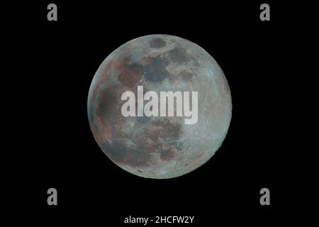 Luna piena attraverso un telescopio Foto Stock