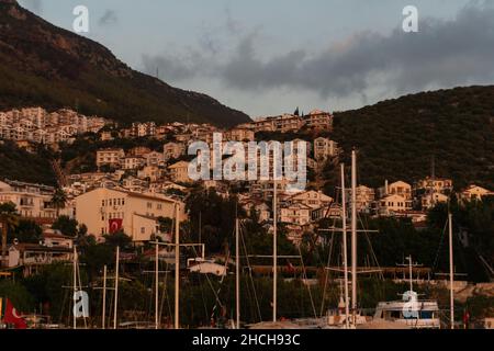 Port and fishing boats during sunset in Kas, Turkey Foto Stock